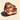 Large copper nugget with a rough, faceted texture resting on a light surface, highlighting its natural metallic shine and organic luxury appeal.